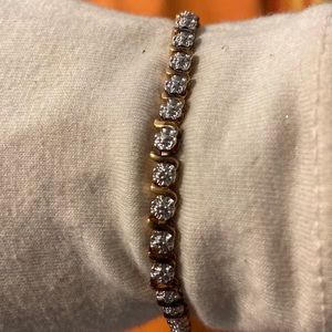 2002 Macys cubic zirconia 18k gold plated over sterling silver tennis bracelet
